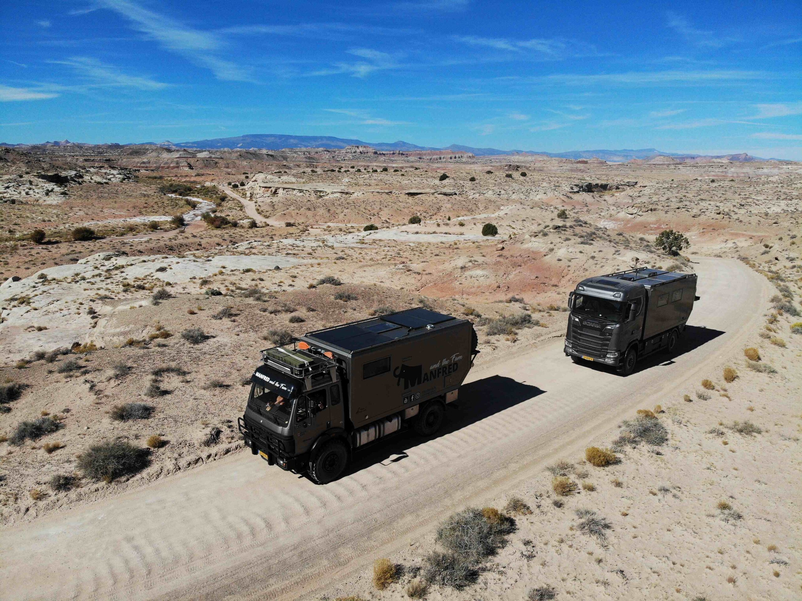 two 4x4 campers in the desert