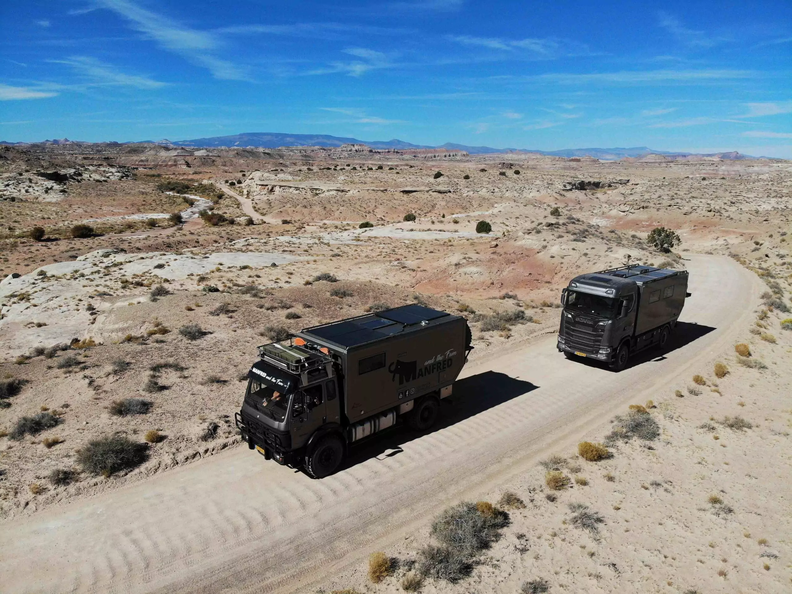 two 4x4 campers in the desert